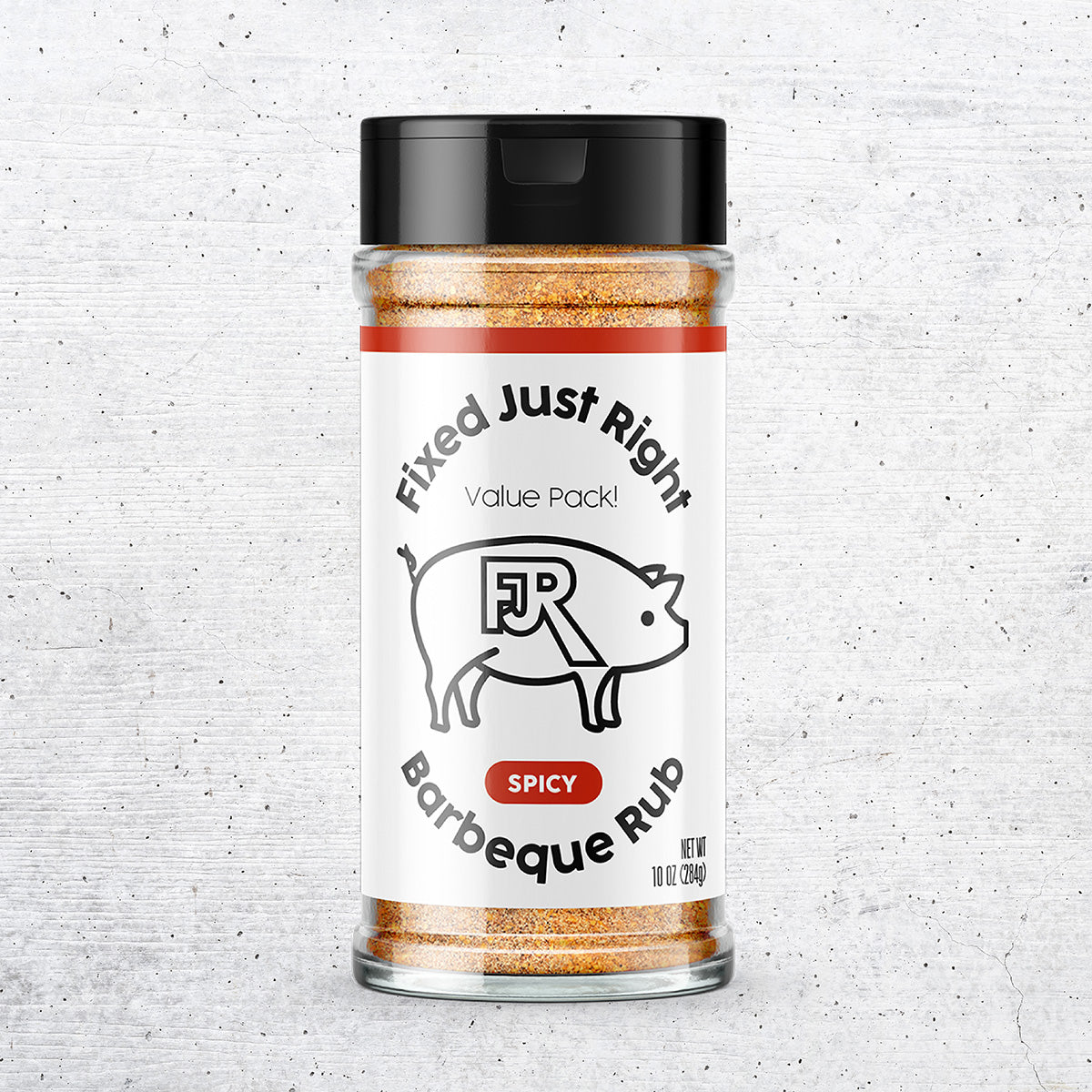 10oz shaker bottle of Fixed Just Right's Spicy Barbecue Rub, featuring the company logo with red accents.