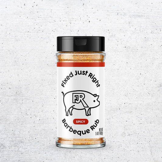 5oz shaker bottle of Fixed Just Right's Spicy Barbecue Rub, featuring the company logo with red accents.